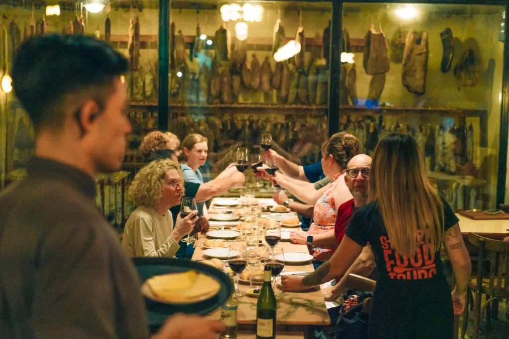 People tasting wine and small plates in a Sherpa Palermo tour