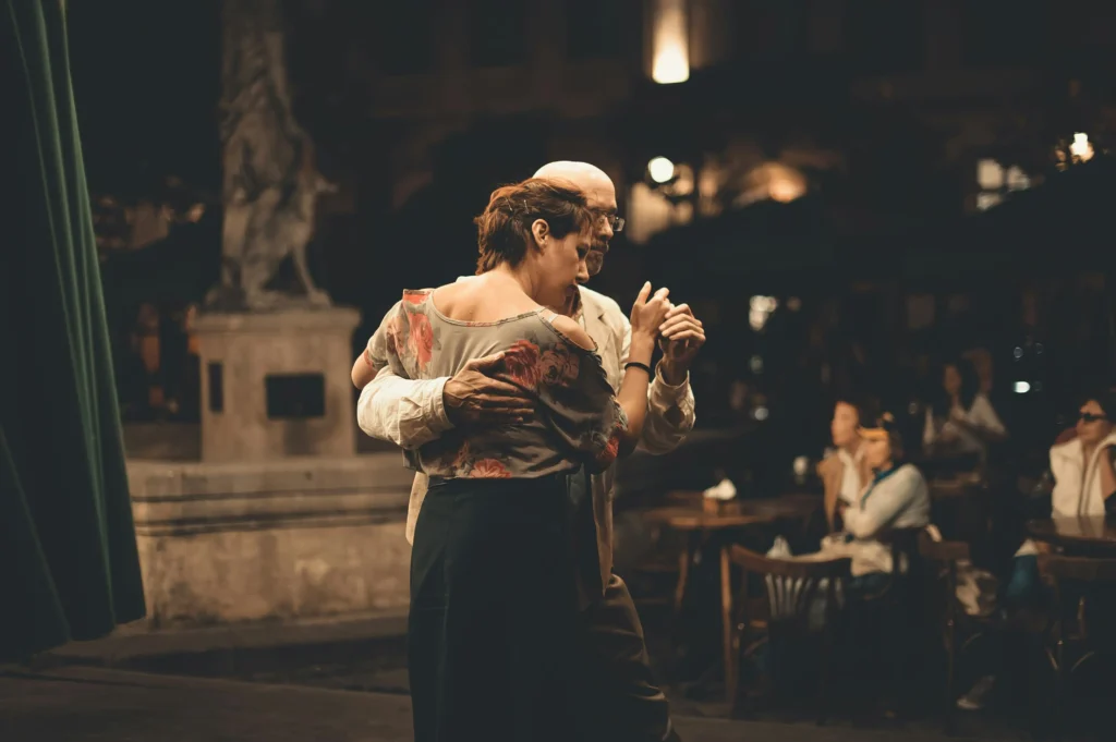 a couple dancing tango in Buenos Aires